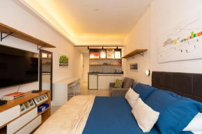 Omar do Rio - DU 57/502: Modern Studio w / Side Sea View, 80 meters from Copacabana Beach, 240mbps Internet + Workstation and Smart TV.